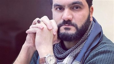 الكاتب 