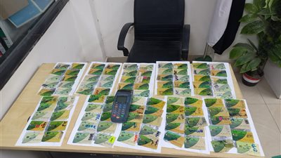 تموين قنا تضبط ماكينة صرف دقيق مدعم و256 بطاقة تموينية بأحد المحال التجارية